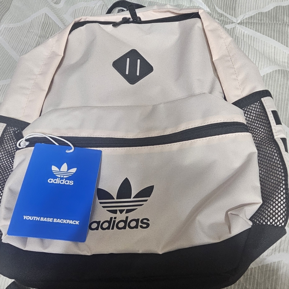 Lite pink and black backpack